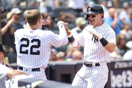 Aug 5, 2023; Bronx, New York, USA;  New York Yankees first baseman Jake Bauers (61) is greeted by center fielder Harrison Bader (22) after hitting a solo home run in the fifth inning against the Houston Astros at Yankee Stadium. Mandatory Credit: Wendell Cruz-USA TODAY Sports