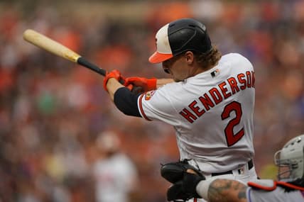 Aug 5, 2023; Baltimore, Maryland, USA; Baltimore Orioles third baseman Gunnar Henderson (2) hits a two run home run against the New York Mets during the first inning at Oriole Park at Camden Yards. Mandatory Credit: Gregory Fisher-USA TODAY Sports