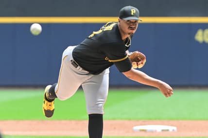 Aug 6, 2023; Milwaukee, Wisconsin, USA; Pittsburgh Pirates pitcher Johan Oviedo (24) pitches against the Milwaukee Brewers in the first inning at American Family Field. Mandatory Credit: Benny Sieu-USA TODAY Sports