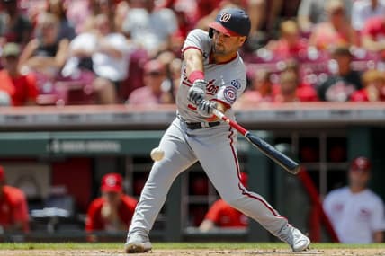 Aug 6, 2023; Cincinnati, Ohio, USA; Washington Nationals second baseman Jake Alu (39) hits a single against the Cincinnati Reds in the first inning at Great American Ball Park. Mandatory Credit: Katie Stratman-USA TODAY Sports