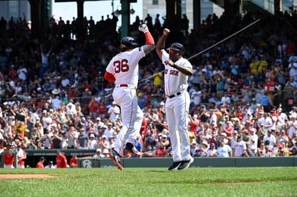 Aug 6, 2023; Boston, Massachusetts, USA; Boston Red Sox first baseman Triston Casas (36) celebrates his home run against the Toronto Blue Jays with third base coach Carlos Febles (53) during the fourth inning at Fenway Park. Mandatory Credit: Eric Canha-USA TODAY Sports