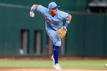 Aug 6, 2023; Arlington, Texas, USA; Texas Rangers third baseman Josh Jung (6) fields a ground ball during the first inning against the Miami Marlins at Globe Life Field. Mandatory Credit: Andrew Dieb-USA TODAY Sports