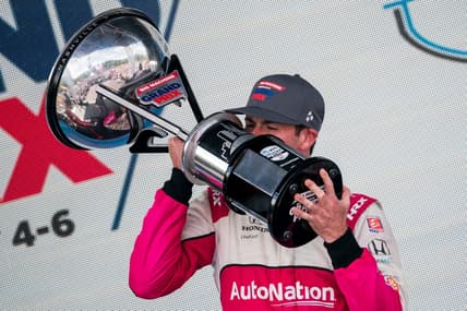NTT IndyCar Series driver Kyle Kirkwood celebrates winning the Music City Grand Prix in Nashville, Tenn., Sunday, Aug. 6, 2023.