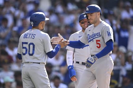 Aug 6, 2023; San Diego, California, USA; Los Angeles Dodgers first baseman Freddie Freeman (5) is congratulated by right fielder Mookie Betts (50) after hitting a two-run home run during the second inning against the San Diego Padres at Petco Park. Mandatory Credit: Orlando Ramirez-USA TODAY Sports