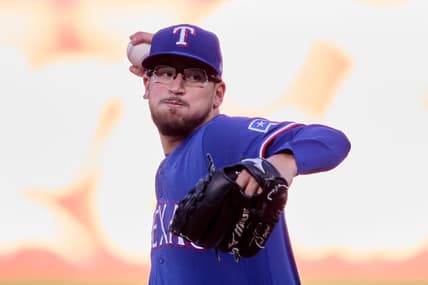 Aug 7, 2023; Oakland, California, USA; Texas Rangers starting pitcher Dane Dunning (33) throws a pitch against the Oakland Athletics during the first inning at Oakland-Alameda County Coliseum. Mandatory Credit: Robert Edwards-USA TODAY Sports