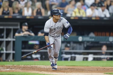 Aug 8, 2023; Chicago, Illinois, USA; New York Yankees center fielder Isiah Kiner-Falefa (12) watches his two-run double against the Chicago White Sox during the fourth inning at Guaranteed Rate Field. Mandatory Credit: Kamil Krzaczynski-USA TODAY Sports
