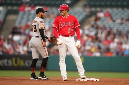 Aug 8, 2023; Anaheim, California, USA; Los Angeles Angels designated hitter Shohei Ohtani (17) talks with San Francisco Giants second baseman Thairo Estrada (39) in the first inning at Angel Stadium. Mandatory Credit: Kirby Lee-USA TODAY Sports