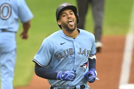 Aug 9, 2023; Cleveland, Ohio, USA; Toronto Blue Jays right fielder George Springer (4) celebrates his solo home run in the first inning against the Cleveland Guardians at Progressive Field. Mandatory Credit: David Richard-USA TODAY Sports