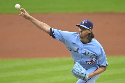 Aug 9, 2023; Cleveland, Ohio, USA; Toronto Blue Jays starting pitcher Kevin Gausman (34) delivers a pitch in the first inning against the Cleveland Guardians at Progressive Field. Mandatory Credit: David Richard-USA TODAY Sports