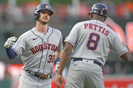 Aug 9, 2023; Baltimore, Maryland, USA; Houston Astros outfielder Kyle Tucker (30) celebrates with coach Gary Pettis (8) following his two run home run in the first inning against the Baltimore Orioles at Oriole Park at Camden Yards. Mandatory Credit: Mitch Stringer-USA TODAY Sports