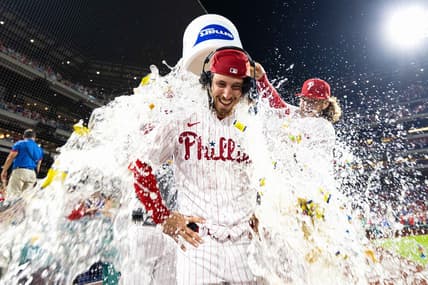 Aug 9, 2023; Philadelphia, Pennsylvania, USA; Philadelphia Phillies starting pitcher Michael Lorenzen (22) is doused with water by first baseman Alec Bohm (28) after pitching a no hit victory against the Washington Nationals at Citizens Bank Park. Mandatory Credit: Bill Streicher-USA TODAY Sports