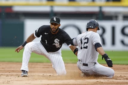 Aug 9, 2023; Chicago, Illinois, USA; New York Yankees center fielder Isiah Kiner-Falefa (12) is caught stealing second base by Chicago White Sox shortstop Elvis Andrus (1) during the second inning at Guaranteed Rate Field. Mandatory Credit: Kamil Krzaczynski-USA TODAY Sports