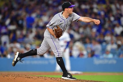 Aug 10, 2023; Los Angeles, California, USA; Colorado Rockies relief pitcher Ty Blach (50) throws against the Los Angeles Dodgers during the sixth inning at Dodger Stadium. Mandatory Credit: Gary A. Vasquez-USA TODAY Sports