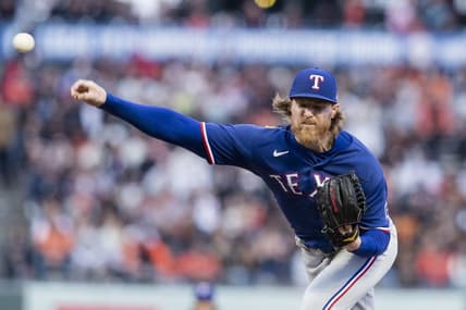 Aug 11, 2023; San Francisco, California, USA; Texas Rangers starting pitcher Jon Gray (22) throws against the San Francisco Giants during the first inning at Oracle Park. Mandatory Credit: John Hefti-USA TODAY Sports
