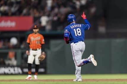 Aug 11, 2023; San Francisco, California, USA; Texas Rangers catcher Mitch Garver (18) runs the bases after hitting a solo home run against the San Francisco Giants during the sixth inning at Oracle Park. Mandatory Credit: John Hefti-USA TODAY Sports