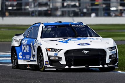 Aug 12, 2023; Speedway, Indiana, USA; NASCAR Cup Series driver Chase Briscoe (14) during qualifying for the Verizon 200 at the Brickyard at Indianapolis Motor Speedway Road Course. Mandatory Credit: Mike Dinovo-USA TODAY Sports