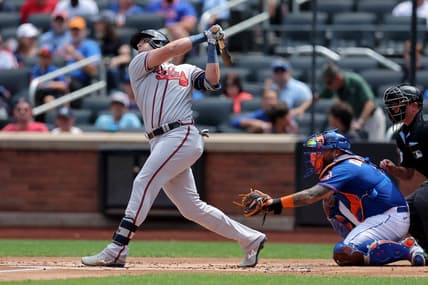 Aug 12, 2023; New York City, New York, USA; Atlanta Braves third baseman Austin Riley (27) follows through on an RBI single against the New York Mets during the first inning at Citi Field. Mandatory Credit: Brad Penner-USA TODAY Sports