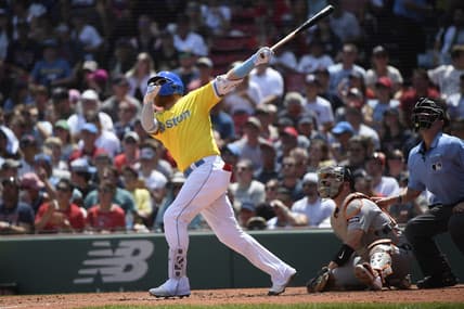 Aug 13, 2023; Boston, Massachusetts, USA;  Boston Red Sox designated hitter Justin Turner (2) hits a home run during the third inning against the Detroit Tigers at Fenway Park. Mandatory Credit: Bob DeChiara-USA TODAY Sports