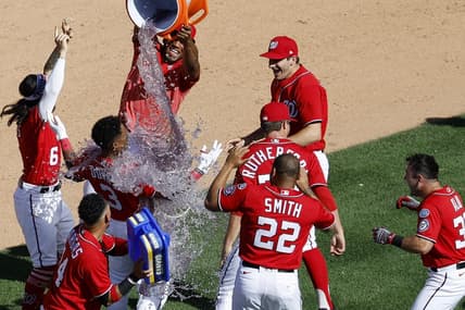 Aug 13, 2023; Washington, District of Columbia, USA; Washington Nationals second baseman Jeter Downs (3) celebrates with teammates after hitting a two run walk off single against the Oakland Athletics during the ninth inning at Nationals Park. Mandatory Credit: Geoff Burke-USA TODAY Sports