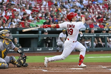 Aug 14, 2023; St. Louis, Missouri, USA;  St. Louis Cardinals shortstop Tommy Edman (19) hits one run single against the Oakland Athletics during the second inning at Busch Stadium. Mandatory Credit: Jeff Curry-USA TODAY Sports