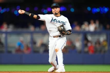 Aug 14, 2023; Miami, Florida, USA; Miami Marlins second baseman Luis Arraez (3) throws the ball to first base for an out against the Houston Astros during the fourth inning at loanDepot Park. Mandatory Credit: Rich Storry-USA TODAY Sports