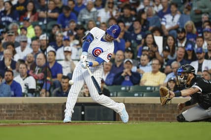 Aug 15, 2023; Chicago, Illinois, USA; Chicago Cubs left fielder Ian Happ (8) hits a two-run home run against the Chicago White Sox during the first inning at Wrigley Field. Mandatory Credit: Kamil Krzaczynski-USA TODAY Sports