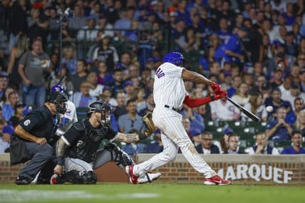 Aug 15, 2023; Chicago, Illinois, USA; Chicago Cubs third baseman Jeimer Candelario (9) singles against the Chicago White Sox during the sixth inning at Wrigley Field. Mandatory Credit: Kamil Krzaczynski-USA TODAY Sports