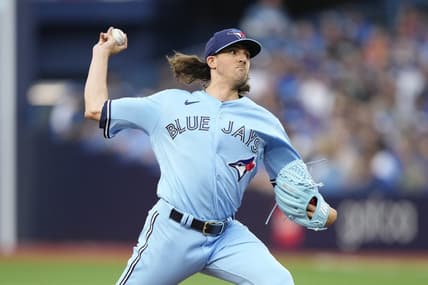 Aug 16, 2023; Toronto, Ontario, CAN; Toronto Blue Jays starting pitcher Kevin Gausman (34) pitches to the Philadelphia Phillies during the first inning at Rogers Centre. Mandatory Credit: John E. Sokolowski-USA TODAY Sports