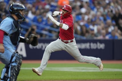 Aug 16, 2023; Toronto, Ontario, CAN; Philadelphia Phillies right fielder Nick Castellanos (8) scores against the Toronto Blue Jays on a sacrifice fly by Philadelphia Phillies left fielder Jake Cave (not pictured) during the second inning at Rogers Centre. Mandatory Credit: John E. Sokolowski-USA TODAY Sports