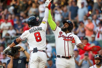 Aug 16, 2023; Atlanta, Georgia, USA; Atlanta Braves left fielder Eddie Rosario (8) celebrates after a home run with designated hitter Marcell Ozuna (20) against the New York Yankees in the second inning at Truist Park. Mandatory Credit: Brett Davis-USA TODAY Sports