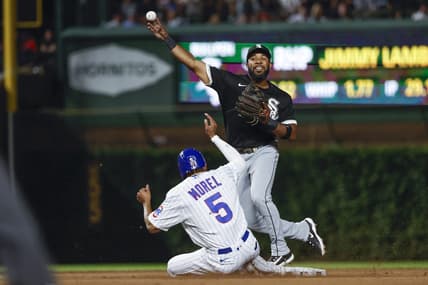 Aug 16, 2023; Chicago, Illinois, USA; Chicago White Sox shortstop Elvis Andrus (1) throws out Chicago Cubs second baseman Christopher Morel (5) at second base during the seventh inning at Wrigley Field. Mandatory Credit: Kamil Krzaczynski-USA TODAY Sports