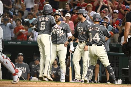 Aug 18, 2023; Washington, District of Columbia, USA; Washington Nationals shortstop CJ Abrams (5) is congratulated by teammates after hitting a three run home run against the Philadelphia Phillies during the fourth inning at Nationals Park. Mandatory Credit: Brad Mills-USA TODAY Sports