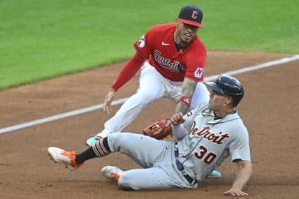 Aug 18, 2023; Cleveland, Ohio, USA; Detroit Tigers right fielder Kerry Carpenter (30) is tagged out by Cleveland Guardians third baseman Gabriel Arias (13) in the second inning at Progressive Field. Mandatory Credit: David Richard-USA TODAY Sports