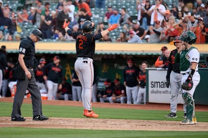 Aug 18, 2023; Oakland, California, USA; Baltimore Orioles infielder Gunnar Henderson (2) jumps onto home plate after hitting a two run home run against the Oakland Athletics during the second inning at Oakland-Alameda County Coliseum. Mandatory Credit: Robert Edwards-USA TODAY Sports