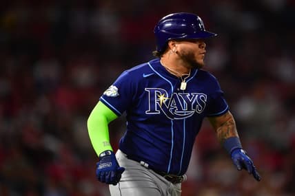 Aug 18, 2023; Anaheim, California, USA; Tampa Bay Rays designated hitter Harold Ramirez (43) runs after hitting an RBI single against the Los Angeles Angels during the seventh inning at Angel Stadium. Mandatory Credit: Gary A. Vasquez-USA TODAY Sports