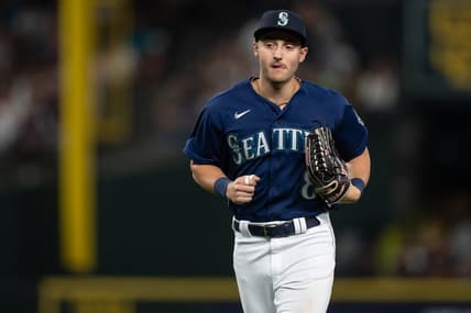 Aug 8, 2023; Seattle, Washington, USA; Seattle Mariners left fielder Dominic Canzone (8) jogs off the field during a game against the San Diego Padres at T-Mobile Park. Mandatory Credit: Stephen Brashear-USA TODAY Sports