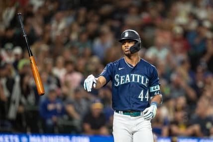 Aug 9, 2023; Seattle, Washington, USA; Seattle Mariners centerfielder Julio Rodriguez (44) tosses his bat after earning a walk against the San Diego Padres at T-Mobile Park. Mandatory Credit: Stephen Brashear-USA TODAY Sports