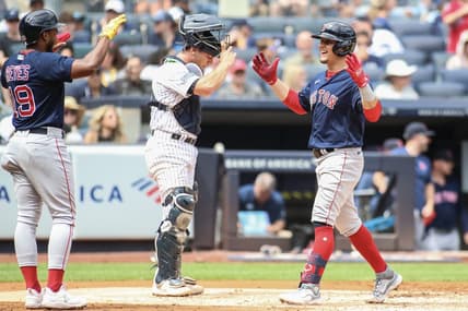 Aug 19, 2023; Bronx, New York, USA;  Boston Red Sox second baseman Luis Urias (right) is greeted by shortstop Pablo Reyes (19) after hitting a grand slam home run in the second inning against the New York Yankees at Yankee Stadium. Mandatory Credit: Wendell Cruz-USA TODAY Sports