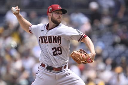 Aug 19, 2023; San Diego, California, USA; Arizona Diamondbacks starting pitcher Merrill Kelly (29) throws a pitch against the San Diego Padres during the first inning at Petco Park. Mandatory Credit: Orlando Ramirez-USA TODAY Sports
