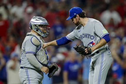Aug 19, 2023; Cincinnati, Ohio, USA; Toronto Blue Jays relief pitcher Jordan Romano (68) celebrates with catcher Alejandro Kirk (30) after their victory over the Cincinnati Reds at Great American Ball Park. Mandatory Credit: Katie Stratman-USA TODAY Sports