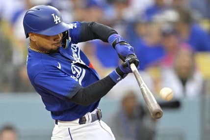 Aug 19, 2023; Los Angeles, California, USA;  Los Angeles Dodgers right fielder Mookie Betts (50) hits a solo home run in the third inning against the Miami Marlins at Dodger Stadium. Mandatory Credit: Jayne Kamin-Oncea-USA TODAY Sports