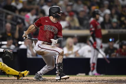 Aug 19, 2023; San Diego, California, USA; Arizona Diamondbacks right fielder Corbin Carroll (7) hits an RBI single against the San Diego Padres during the sixth inning at Petco Park. Mandatory Credit: Orlando Ramirez-USA TODAY Sports