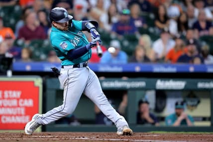 Aug 20, 2023; Houston, Texas, USA; Seattle Mariners catcher Brian O'Keefe (64) hits an RBI double to left field against the Houston Astros during the third inning at Minute Maid Park. Mandatory Credit: Erik Williams-USA TODAY Sports