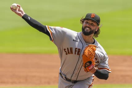 Aug 20, 2023; Cumberland, Georgia, USA; San Francisco Giants pitcher Jakob Junis (34) pitches against the Atlanta Braves during the first inning at Truist Park. Mandatory Credit: Dale Zanine-USA TODAY Sports