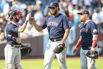 Aug 20, 2023; Bronx, New York, USA;  Boston Red Sox relief pitcher Kenley Jansen (74) celebrates with catcher Connor Wong (12) and first baseman Justin Turner (2) after defeating the New York Yankees 6-5 at Yankee Stadium. Mandatory Credit: Wendell Cruz-USA TODAY Sports