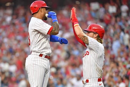 Aug 21, 2023; Philadelphia, Pennsylvania, USA; Philadelphia Phillies third baseman Edmundo Sosa (33) celebrates his home run with second baseman Bryson Stott (5) during the second inning against the San Francisco Giants at Citizens Bank Park. Mandatory Credit: Eric Hartline-USA TODAY Sports