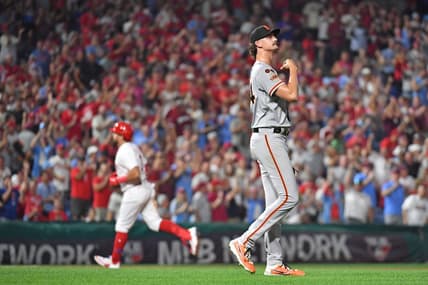 Aug 21, 2023; Philadelphia, Pennsylvania, USA; San Francisco Giants relief pitcher Sean Hjelle (64) reacts after allowing two-run home run to Philadelphia Phillies left fielder Kyle Schwarber (12) during the seventh inning at Citizens Bank Park. Mandatory Credit: Eric Hartline-USA TODAY Sports