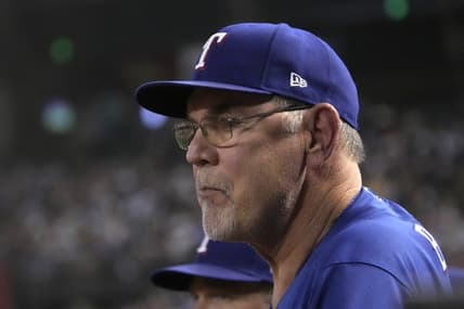 Aug 21, 2023; Phoenix, Arizona, USA; Texas Rangers manager Bruce Bochy (15) watches game action against the Arizona Diamondbacks during the third inning at Chase Field. Mandatory Credit: Rick Scuteri-USA TODAY Sports