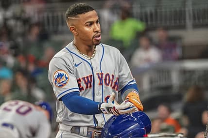 Aug 21, 2023; Cumberland, Georgia, USA; New York Mets shortstop Francisco Lindor (12) reacts at the dugout steps after hitting a three run home run against the Atlanta Braves during the sixth inning at Truist Park. Mandatory Credit: Dale Zanine-USA TODAY Sports
