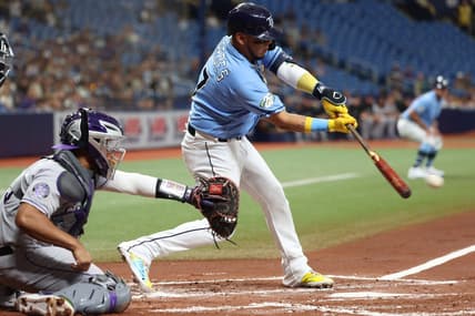 Aug 22, 2023; St. Petersburg, Florida, USA; Tampa Bay Rays third baseman Isaac Paredes (17) hits a sacrifice RBI against the Colorado Rockies during the first inning at Tropicana Field. Mandatory Credit: Kim Klement Neitzel-USA TODAY Sports